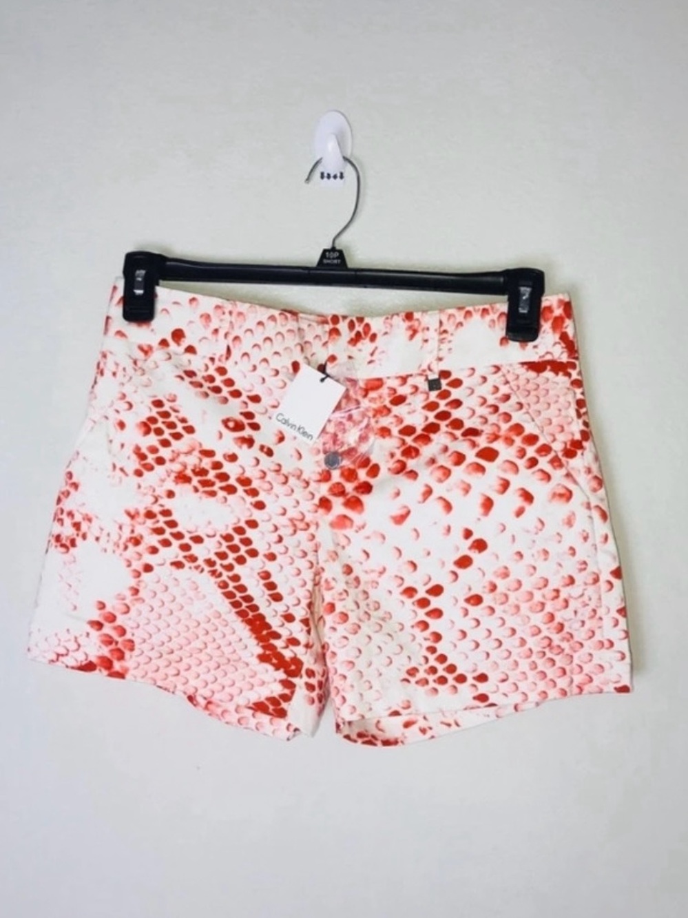 Calvin Klein White Shorts with Coral Dot Pattern